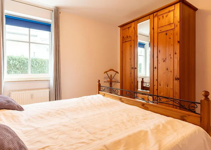 Ferienwohnung-2-kranich-villa-vogelsang-in-binz-3-raum-parkplatz-wlan-wintergarten-terrasse Lägenhet *